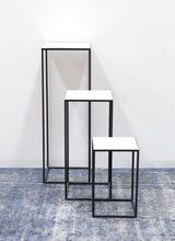 3. "Earth Wind & Fire Marble Pedestal Set Of Three - Unique artistic centerpiece"