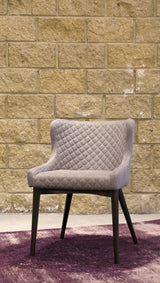 8. "Light Grey Mila Dining Chair offering a blend of style, comfort, and functionality"