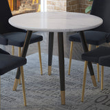 4. "Emery Round Dining Table - Versatile and elegant addition to any dining room"