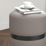 6. "Warm Grey and Black Demi Round Ottoman - Ideal for Relaxation and Extra Seating"