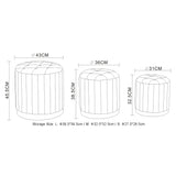 8. "Beige and Black Ottoman Set - Practical and Chic Storage Solution"