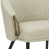 7. "Zita Accent Chair in Vintage Ivory Faux Leather and Black - Statement Piece for Your Living Space"