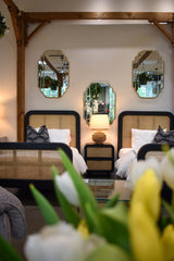 11. "Chic Cane Oval Two Drawer Night Stand with smooth gliding drawers"