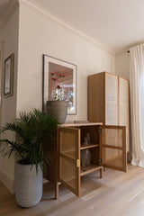 9. Natural cane bookcase with full door compartments