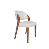 1. "Elegant and comfortable Paul Dining Chair with cushioned seat and backrest"