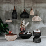 4. "Wave-inspired black side table for contemporary interiors"