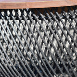 9. "Black side table with a distinctive and eye-catching design"