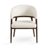 A fresh take on the traditional accent chair with soft ivory linen upholstered curves, Ash wood legs with walnut finish and Polished gold trim