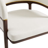 A fresh take on the traditional accent chair with soft ivory linen upholstered curves, Ash wood legs with walnut finish and Polished gold trim