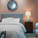 8. "Dovetail Grey Linen Queen Bed with practical storage solutions for a clutter-free room"