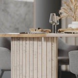 9. "Hedron Dining Table with contemporary metal accents"