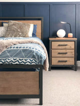 7. "Image of Irondale Queen Bed with durable metal frame and sleek finish"