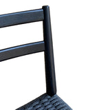 4. "Enhance your dining space with the Jakarta Dining Chair - Black/Black Woven Seat"