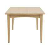 3. "Lumina Dining Table with Glass Top - Adds a touch of sophistication to any room"