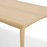 8. "Lumina Dining Table - Easy to clean and maintain for hassle-free dining experiences"