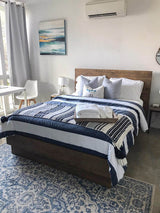 7. "Create a cozy ambiance with the Nevada Queen Bed - Dark Driftwood"