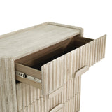 8. "Elegant Oasis 4 Drawer Chest with decorative metal handles"