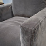 9. "Grey Heston Club Chair with sleek and timeless design"