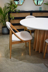 8. "Eye-catching Sculpture Dining Table with intricate detailing"