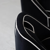 7. "Black Ebony Club Chair, a timeless addition to your furniture collection"