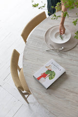 5. "Functional Donatella Dining Table with ample storage space and a sturdy construction"