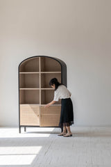 7. "Sleek Pietro Tall Cabinet with a modern aesthetic to enhance any room"