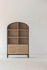 9. "Organize your belongings with the Pietro Tall Cabinet's spacious interior"