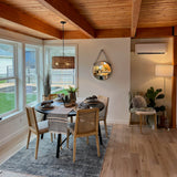 12. Natural frame cane dining chair with oyster linen seat for a stylish and comfortable addition to your dining area