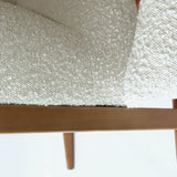 8. "Cloud Boucle Clarita Club Chair with a versatile design suitable for any living space"