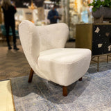 9. "Sophisticated Mellow Club Chair for a refined look"