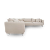 Lyric Sectional boasts generously cushioned arms, back, and seats. Upholstered in a stunning neutral-colored polyester fabric, this sectional is designed for stylish relaxation. The contemporary touch of modern black metal legs adds an elegant flair to the overall design. With ample seating, the Lyric Sectional seamlessly integrates into your living or entertainment rooms, becoming a focal point of your home decor.