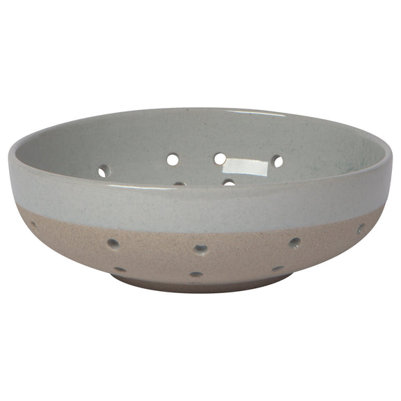 glazed ceramic berry bowl with holes to let moisture escape. 