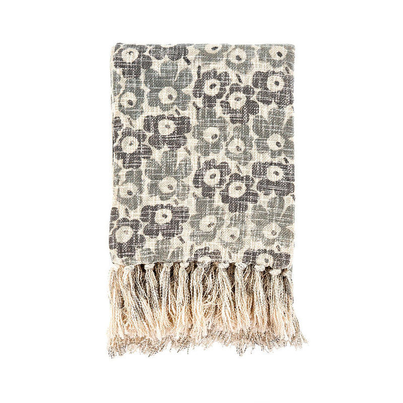 Bring a touch of the outdoors inside. The Meadow Throw offers a playful touch to your interior design scheme, with its beautiful botanical pattern and playful fringe trim.