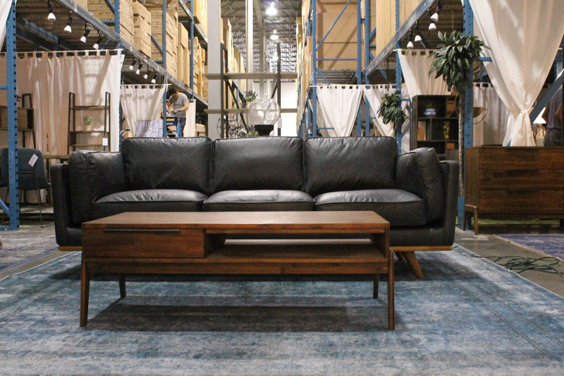 6. "Contemporary Remix Coffee Table with a unique geometric base"