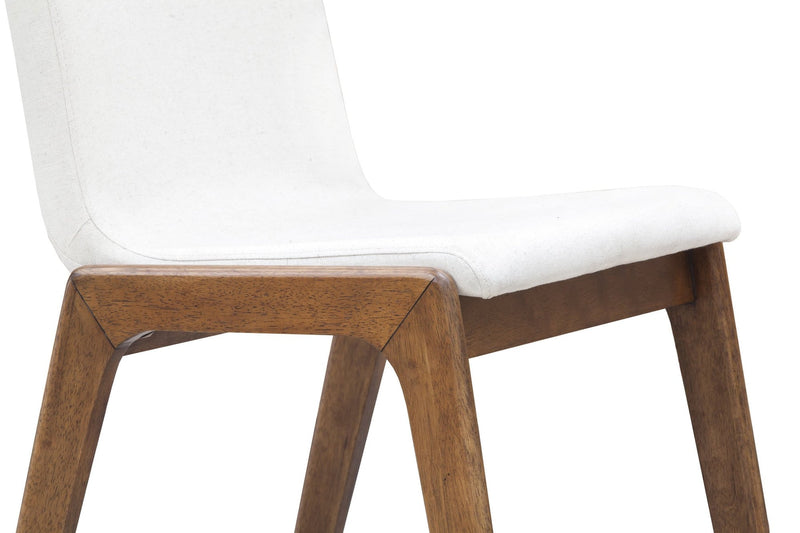 5. "Cream-colored Remix Dining Chair with ergonomic backrest for optimal comfort"