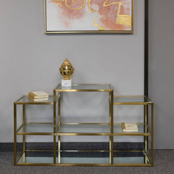 2. "Stylish gold console table with multiple levels for added storage and display"