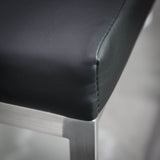 6. "Black Leatherette K-Chair - Ideal for home offices and professional workspaces"