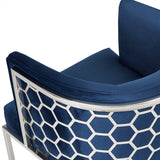 7. "Blue Velvet Chamberlain Chair - Enhance Your Living Space with a Pop of Color"