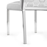 7. "Riley Dining Chair in Grey Velvet - Elevate your dining space with this chic and cozy chair"