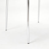 3. "Moira Dining Chair in Taupe Leatherette - Enhance your dining experience with this chic seating solution"