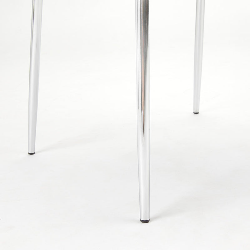 3. "Moira Dining Chair in Taupe Leatherette - Enhance your dining experience with this chic seating solution"
