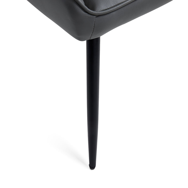 3. "Emily Black Dining Chair in Dark Grey Leatherette - Enhance your dining experience with this modern seating solution"
