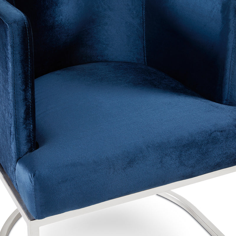 5. "Theo chair in blue velvet - versatile and timeless design for any interior"