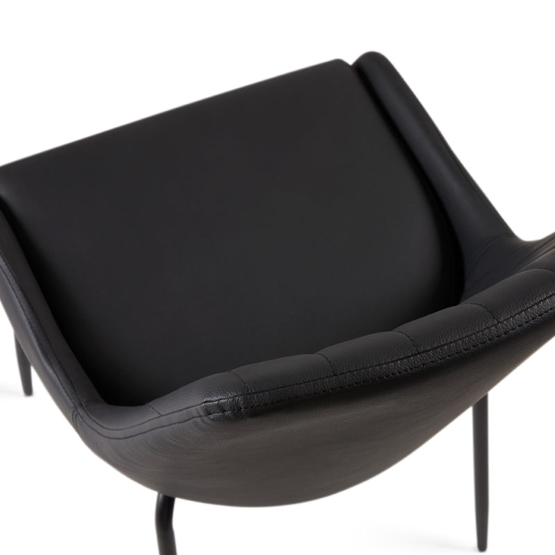 7. "Moira Black Dining Chair: Black Leatherette - Ergonomic design for optimal comfort during meals"