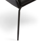 5. "Moira Black Dining Chair: Black Leatherette - Perfect addition to any contemporary dining space"