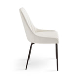 3. "Moira Black Dining Chair in White Leatherette - Perfect addition to any modern dining space"