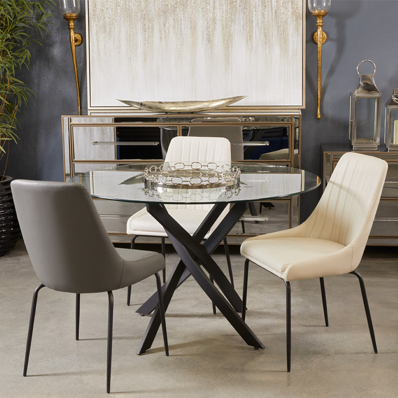 10. "White Leatherette Moira Black Dining Chair - Add a touch of sophistication to your dining area"