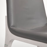 4. "Grey Leatherette Minos Chair - Enhance your dining space with elegance"