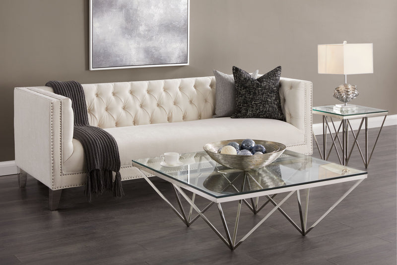 2. "Stylish Luxor Coffee Table featuring a sturdy metal frame and spacious storage shelf"
