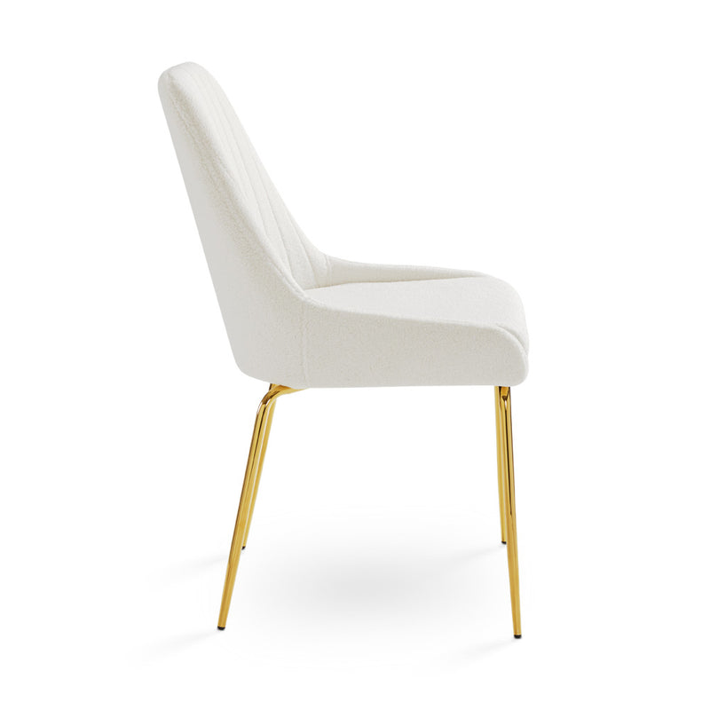 3. Moira Gold Dining Chair: Boucle Fabric - Luxurious and durable seating solution for your home